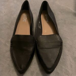 Black leather flats